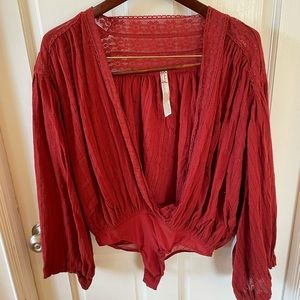 NWT: NEVER WORN Free People plunge crossover thong bodysuit. red w/ lace detail